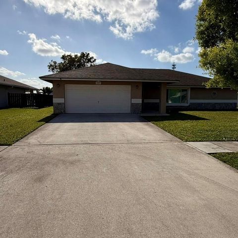147 Sunflower Circle, Royal Palm Beach, FL 33411