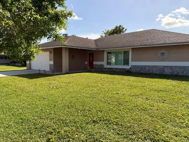 147 Sunflower Circle, Royal Palm Beach, FL 33411