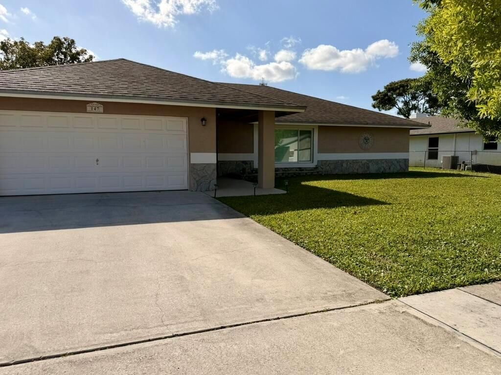 147 Sunflower Circle, Royal Palm Beach, FL 33411