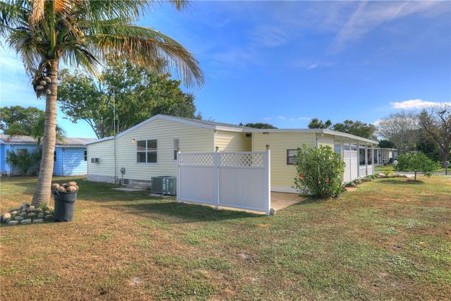 922 Hemlock Street, Barefoot Bay, FL 32976