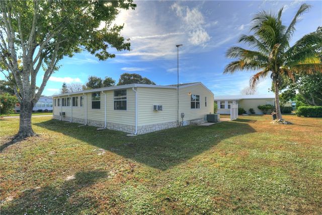 922 Hemlock Street, Barefoot Bay, FL 32976