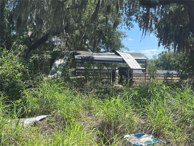 9315 E TREASURE ISLAND AVENUE, Leesburg, FL 34788