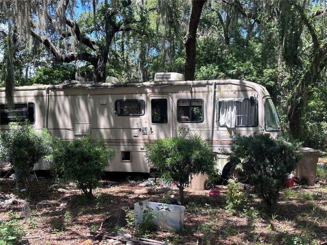 9315 E TREASURE ISLAND AVENUE, Leesburg, FL 34788