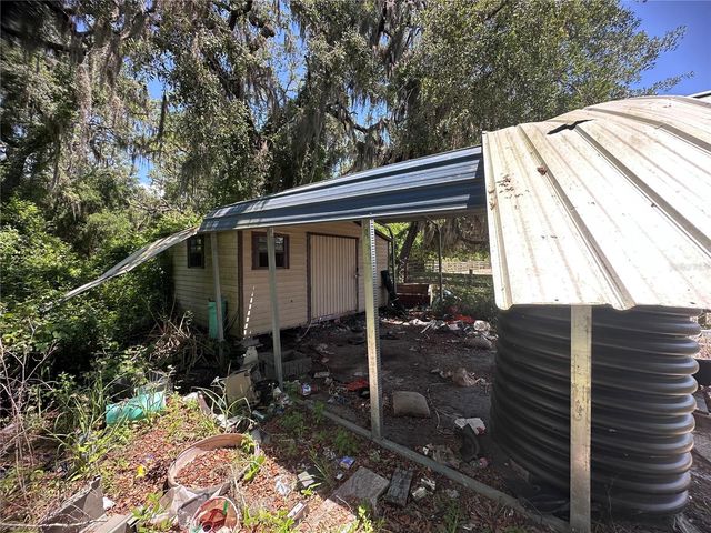 9315 E TREASURE ISLAND AVENUE, Leesburg, FL 34788