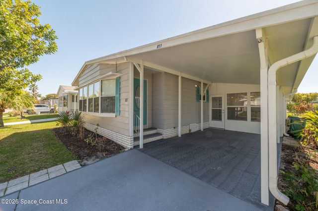 811 Silverthorn Court, Barefoot Bay, FL 32976