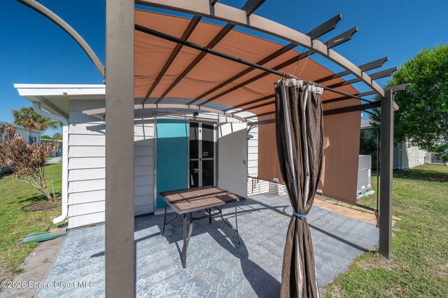 811 Silverthorn Court, Barefoot Bay, FL 32976