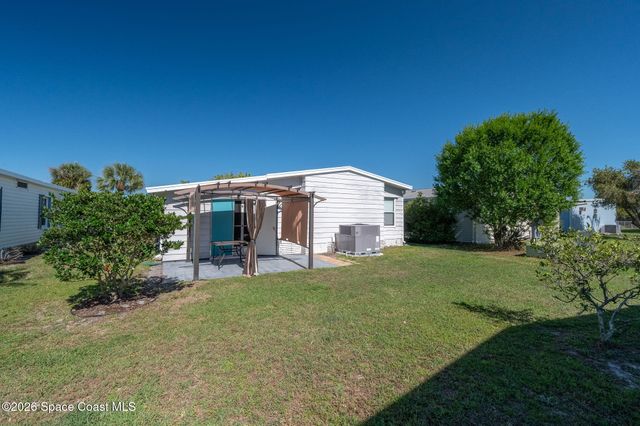 811 Silverthorn Court, Barefoot Bay, FL 32976