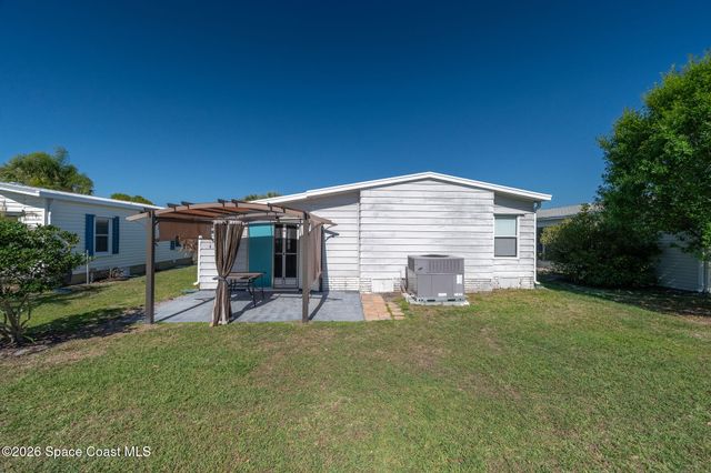 811 Silverthorn Court, Barefoot Bay, FL 32976