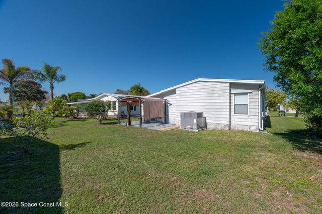 811 Silverthorn Court, Barefoot Bay, FL 32976