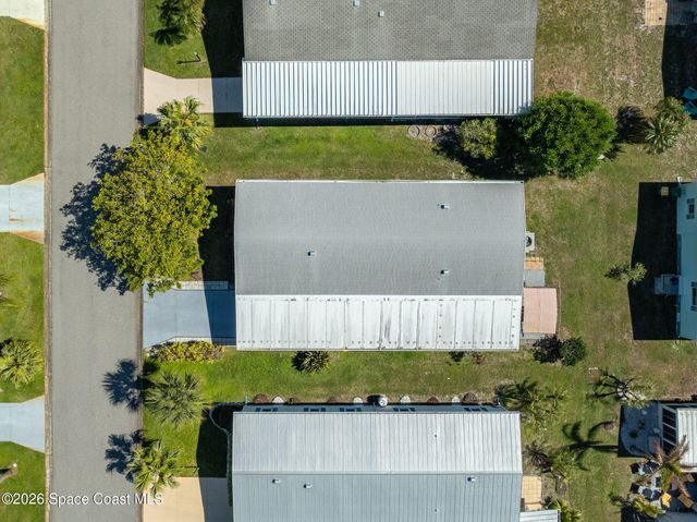 811 Silverthorn Court, Barefoot Bay, FL 32976