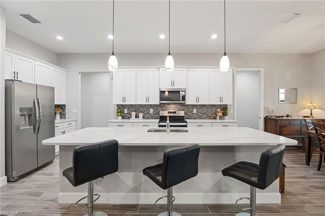 1110 NE 7th PL, Cape Coral, FL 33909