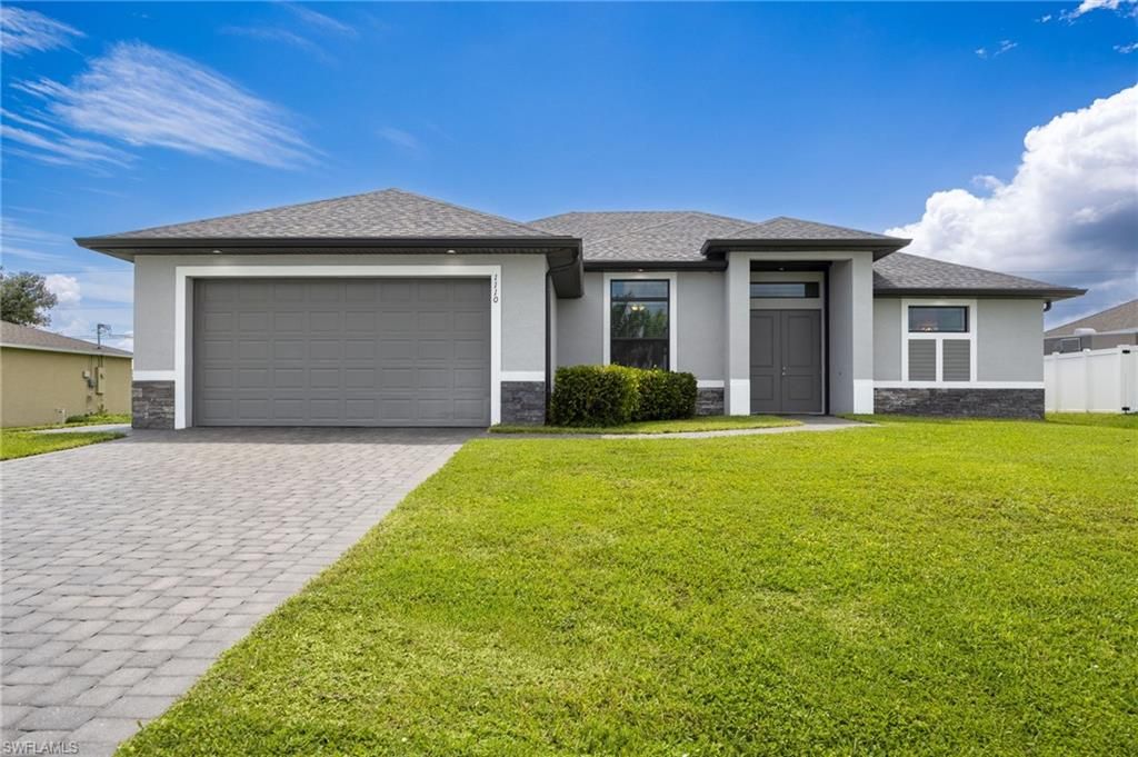 Image 2 of property listing at 1110 NE 7th PL, Cape Coral, FL 33909