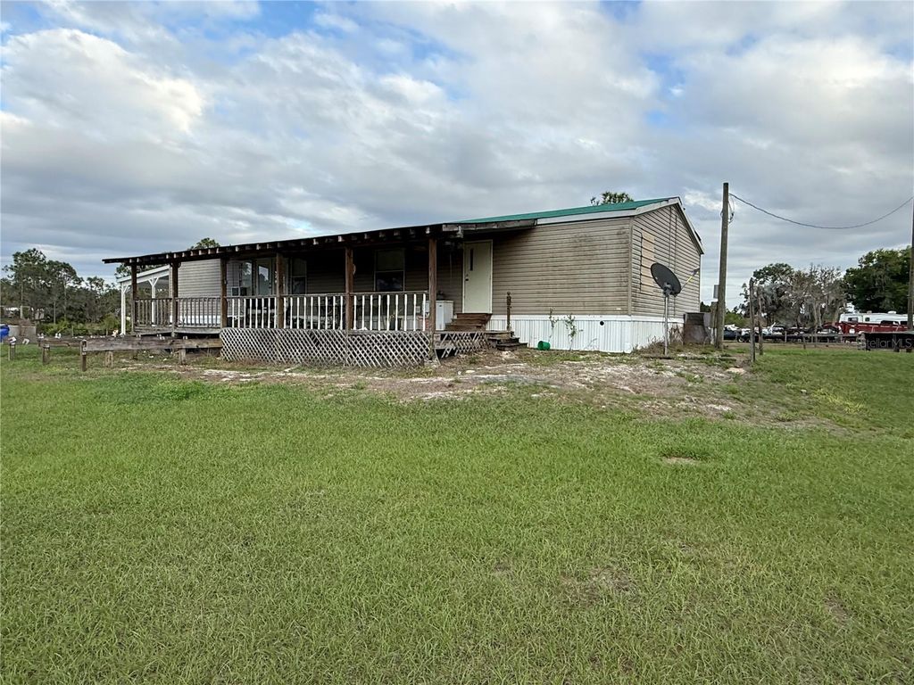 Image 1 of property listing at 301 GOLDEN TRAIL, Lake Placid, FL 33852