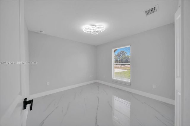 1042 Darlington Street, Lehigh Acres, FL 33974