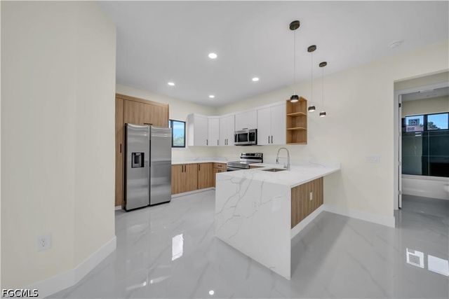 4016 9th ST SW, Lehigh Acres, FL 33976