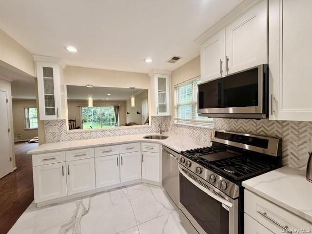 2 Herrels Circle, Melville, NY 11747