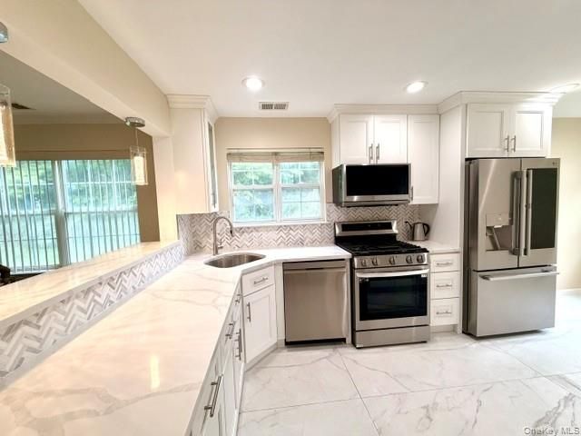 2 Herrels Circle, Melville, NY 11747