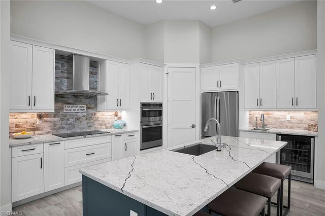 384 Heathwood DR, Marco Island, FL 34145