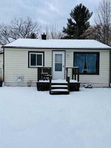 203 Gasoline Alley, Houghton Lake, MI 48629