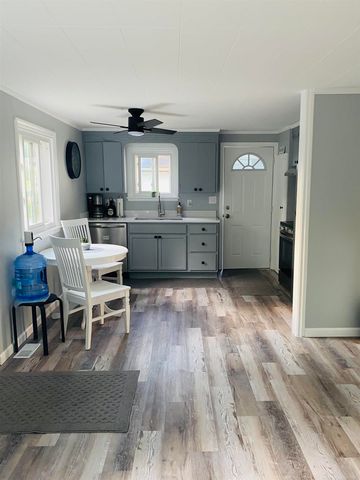 203 Gasoline Alley, Houghton Lake, MI 48629