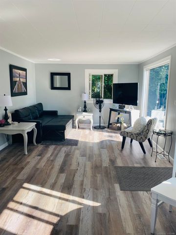 203 Gasoline Alley, Houghton Lake, MI 48629