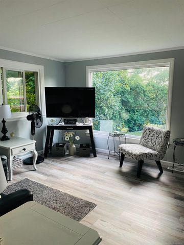 203 Gasoline Alley, Houghton Lake, MI 48629