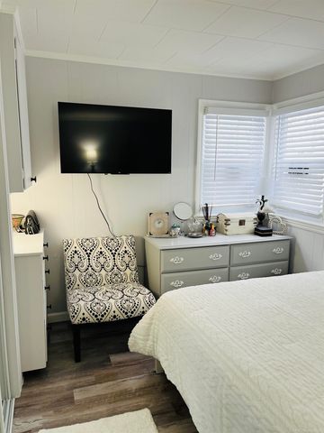 203 Gasoline Alley, Houghton Lake, MI 48629