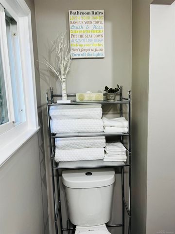 203 Gasoline Alley, Houghton Lake, MI 48629