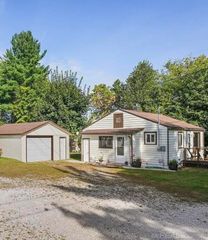 203 Gasoline Alley, Houghton Lake, MI 48629