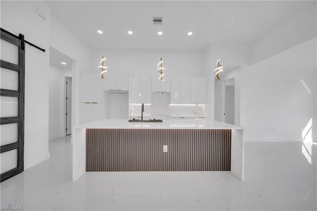 697 Whitmore LOOP, Lehigh Acres, FL 33972