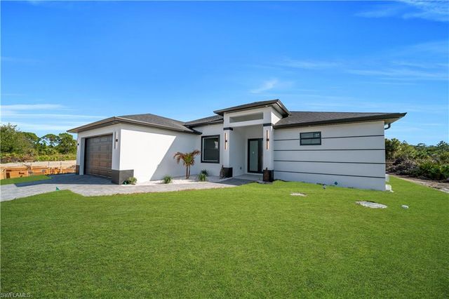 697 Whitmore LOOP, Lehigh Acres, FL 33972