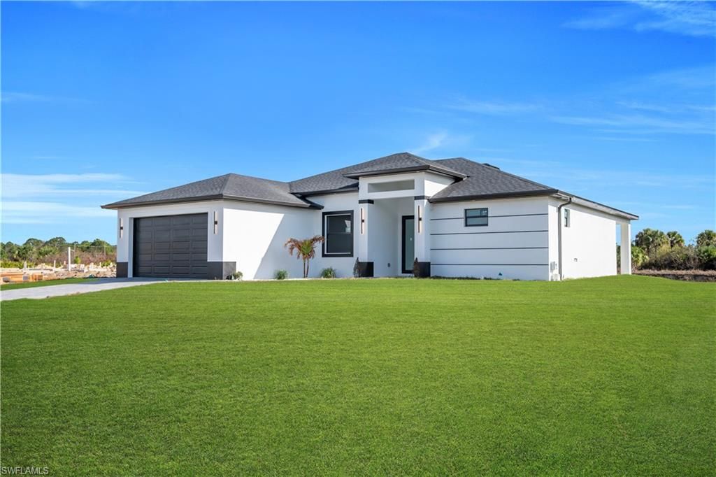 697 Whitmore LOOP, Lehigh Acres, FL 33972