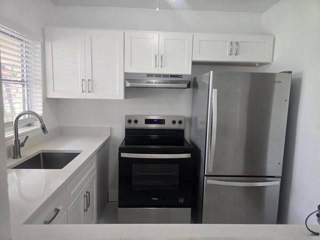 3030 NW 43rd Terrace 102, Lauderdale Lakes, FL 33313