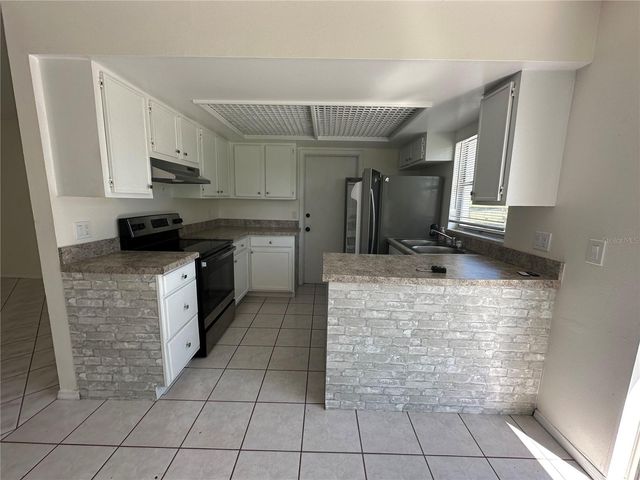 12643 IDAHO WOODS LANE, Orlando, FL 32824