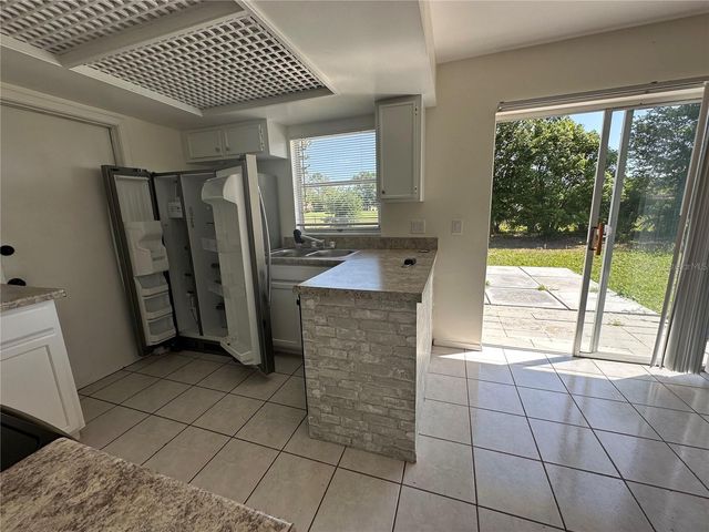 12643 IDAHO WOODS LANE, Orlando, FL 32824