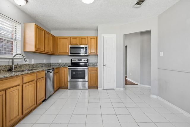 2117 Whispering Wind Street, Fort Worth, TX 76108