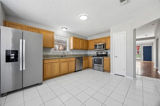 2117 Whispering Wind Street, Fort Worth, TX 76108