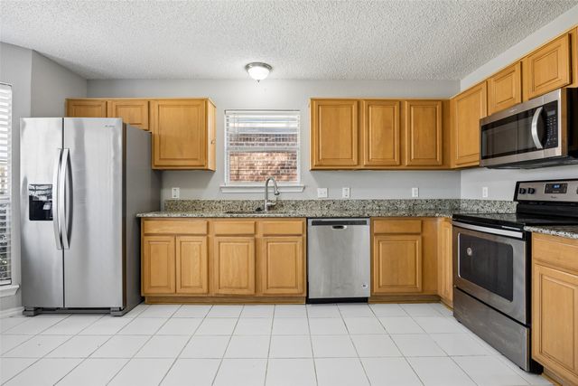 2117 Whispering Wind Street, Fort Worth, TX 76108