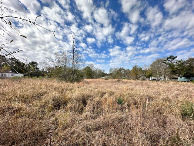 228 County Road 3431 E, Cleveland, TX 77327