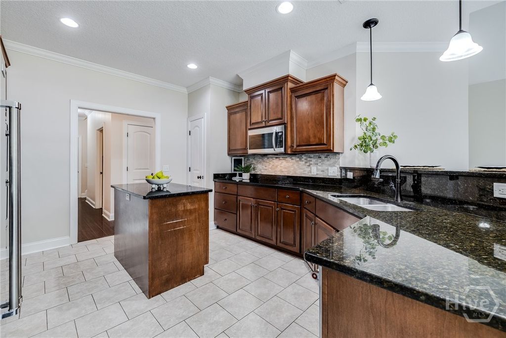 Image 14 of property listing at 209 Zittrouer Road, Guyton, GA 31312