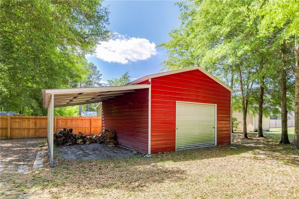 Image 50 of property listing at 209 Zittrouer Road, Guyton, GA 31312