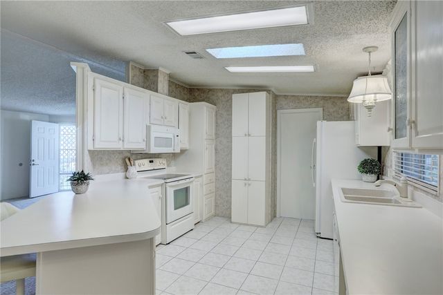 7622 Longhorn Avenue 16, Micco, FL 32976