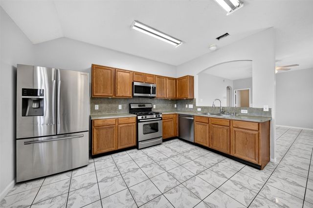 20023 Ravenmeadow Lane, Katy, TX 77449