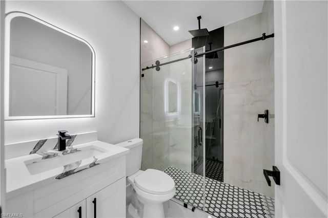 907 E 9th ST, Lehigh Acres, FL 33972