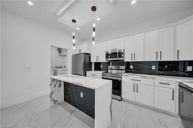 907 E 9th ST, Lehigh Acres, FL 33972