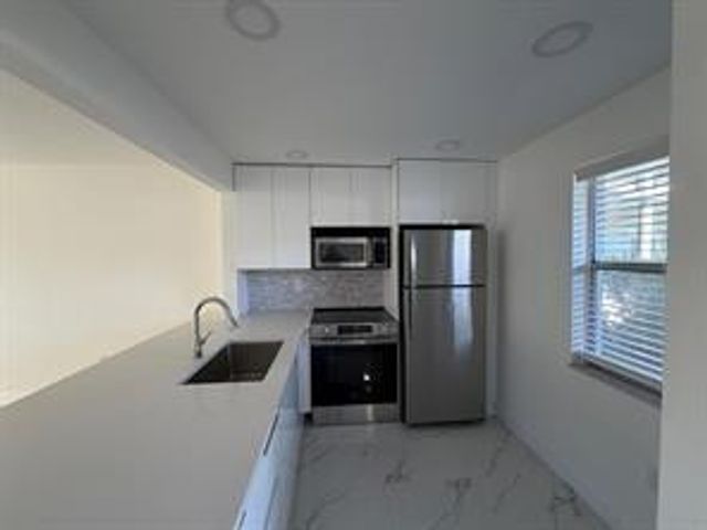 9301 W Lime Bay Boulevard 102, Tamarac, FL 33321