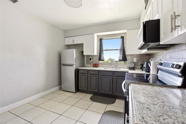 1702 BIRCHWOOD CIRCLE A, Leesburg, FL 34748