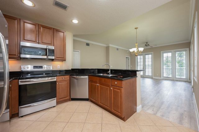 1501 NORTHERN HARRIER WAY 203, Reunion, FL 34747