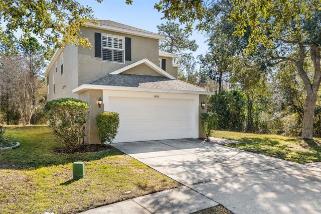 9450 LEATHERWOOD AVENUE, Tampa, FL 33647