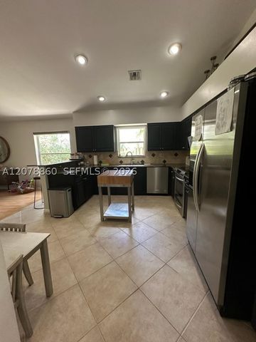 12741 Meadowbreeze Dr, Wellington, FL 33414